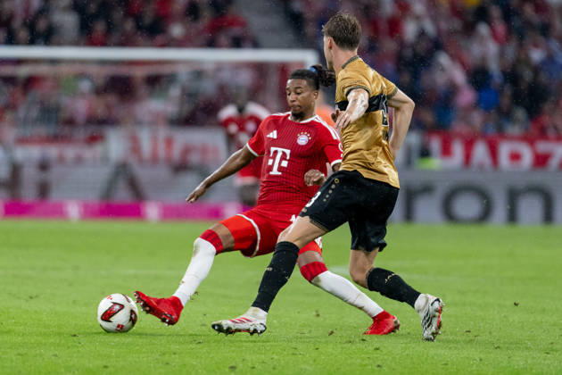Battle for the Ball: Tackle between Michael Olise (FC Bayern Munich, 17) and Ramon Hendriks (VfB Stuttgart, 03 GER), FC Bayern Munich vs. VfB Stuttgart, Soccer, Bundesliga, Matchday 1, 2026–2027 Season, August 28, 2026 DFL and DFB regulations prohibit any use of photographs as image sequences and or quasi-video. Photo: HMB Media, Heike Feiner Copyright: HMBxMedia HeikexFeiner