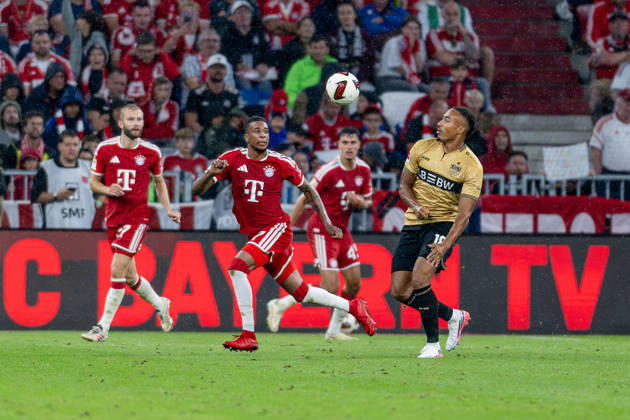 Battle for the Ball: Tackle between Michael Olise (FC Bayern Munich, 17) and Jamie Leweling (VfB Stuttgart, 18) GER, FC Bayern Munich vs. VfB Stuttgart, Soccer, Bundesliga, Matchday 1, 2026–2027 season, August 28, 2026. DFL and DFB regulations prohibit any use of photographs as image sequences and or quasi-video. Photo: HMB Media, Heike Feiner Copyright: HMBxMedia HeikexFeiner