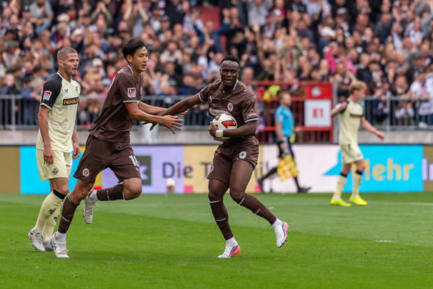 Goal: 1–2 by Abdoulie Ceesay (FC St. Pauli), No. 09, celebrates with Taichi Hara (FC St. Pauli), No. 18, GER, FC St. Pauli vs. 1. FC Kaiserslautern, Soccer, 2. Bundesliga, Matchday 3, 2026–2027 Season, August 30, 2026 DFL regulations prohibit any use of photographs as image sequences and or quasi-video, GER, FC St. Pauli vs. 1. FC Kaiserslautern, Soccer, 2. Bundesliga, Matchday 3, 2026–2027 Season, August 30, 2026, Hamburg Copyright: xEibner-Pressefoto MaxxVincenx EP_MVN