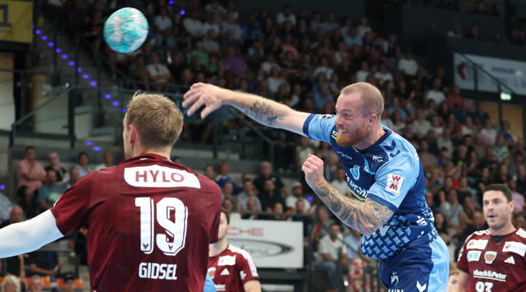 September 6, 2026, Germany, Stuttgart, Handball: TVB Stuttgart vs. Füchse Berlin; from left: Mathias Gisdel (Berlin), Patrick Zieker (TVB)