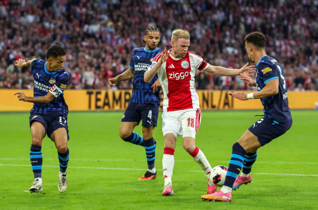 AMSTERDAM: AFC Ajax Amsterdam midfielder Davy Klaassen with PSV Eindhoven forward Ivan Perisic and PSV Eindhoven defender Mauro Junior during the Vriendenloterij Eredivisie match between Ajax and PSV at the Johan Cruijff ArenA on September 5, 2026, in Amsterdam, Netherlands PETER LOUS EYE4IMAGES DeFodi Images