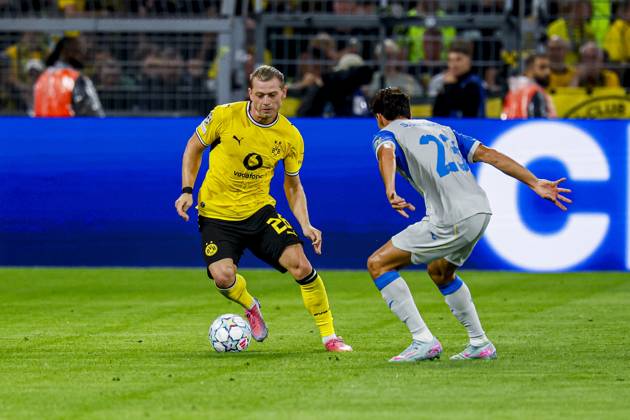 DORTMUND - Daniel Svensson of Borussia Dortmund dribbles with the ball under pressure from Sergi Cardona of Villarreal CF during the UEFA Champions League match between Borussia Dortmund and Villarreal CF at Signal Iduna Park on 08 September 2026 in Dortmund, Germany. MARCEL TER BALS ANP UEFA Champions League 2026 27 xVIxANPxSportx xMarcelxterxBalsxIVx 567692508 originalFilename: 567692508