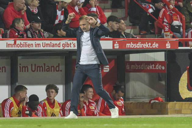 In the photo, from left: Mauro Lustrinelli, Union Berlin coach, looking sad, depressed, and angry; GER; Berlin; soccer; 1. FC Union Berlin vs. FC Schalke 04; at the Alte Försterei; September 11, 2026; DFB and DFL regulations prohibit any use of photographs as image sequences and or quasi-video, Copyright: HMBxMedia UwexKoch