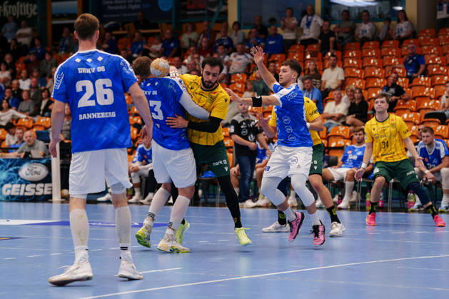 2nd Handball Bundesliga, Matchday 3: Dessau Roßlauer HV 06 vs. VfL Eintracht Hagen; Valentin Neagu of Dessau Roßlauer HV 06, 13, and Juan de la Pena, VfL Eintracht Hagen, 13, in a one-on-one battle on September 11, 2026, at the Anhalt Arena in Dessau-Roßlau, Saxony-Anhalt, Dessau-Roßlau, Anhalt Arena, Saxony-Anhalt, Germany