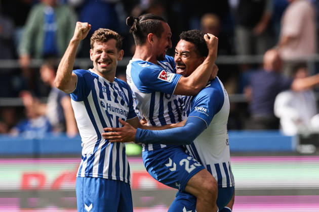Goal celebration: Goal scorer Emmanuel Iyoha (1 FC Magdeburg, 8) scores the 1-0 goal with Baris Atik (1 FC Magdeburg, 23) and Alexander Nollenberger (1 FC Magdeburg,17, 2026–2027 Bundesliga season: 1 FC Magdeburg vs. 1 FC Kaiserslautern at the Avnet Arena in Magdeburg; action, soccer, man, men, Germany, September 12, 2026