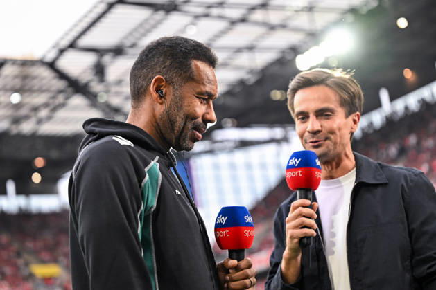 September 12, 2026, GER, Soccer, Men s, 1st Bundesliga, 2026–2027 season, Matchday 3, 1. FC Köln vs. SV Werder Bremen; Daniel Thioune (Werder Bremen), coach, with Max Zielke (Sky TV reporter); DFB and DFL regulations prohibit any use of photographs as image sequences and or quasi-video; Köln Rhein Energie Stadium, North Rhine-Westphalia, Germany Copyright: xNordphoto Wiegandx