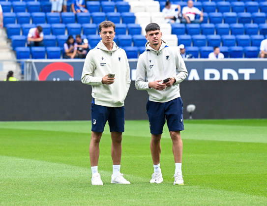 September 12, 2026, SNP Arena, Sinsheim, GER, 1. Bundesliga, TSG Hoffenheim vs. VfB Stuttgart, Fisnik Asllani (Hoffenheim), Albian Hajdari (Hoffenheim). DFL regulations prohibit any use of photographs as image sequences and or quasi-video. Photo by Hasan Bratic, DeFodi Images