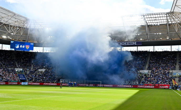 September 12, 2026, SNP Arena, Sinsheim, GER, 1. Bundesliga, TSG Hoffenheim vs. VfB Stuttgart, blue smoke rising from the Hoffenheim fan section. DFL regulations prohibit any use of photographs as image sequences and or quasi-video. Photo by Hasan Bratic, DeFodi Images