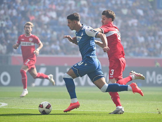 September 12, 2026, SNP Arena, Sinsheim, GER, 1. Bundesliga, TSG Hoffenheim vs. VfB Stuttgart, Adam Hlozek (Hoffenheim), Ramon Hendriks (Stuttgart). DFL regulations prohibit any use of photographs as image sequences and or quasi-video. Photo by Hasan Bratic, DeFodi Images