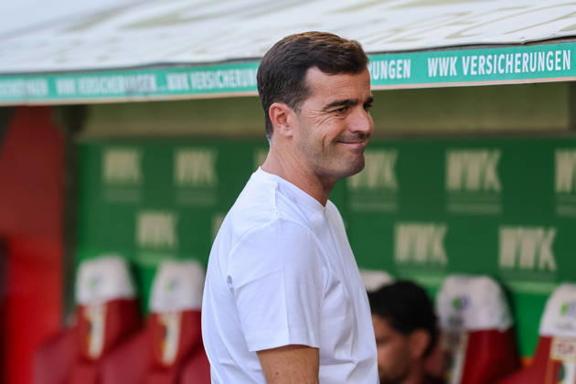 Carles Martinez, Bayer 04 Leverkusen, Head Coach before the game, cutout, portrait, facial expressions, side view, GER, FC Augsburg vs. Bayer 04 Leverkusen, soccer, Bundesliga, Matchday 3, 2026–2027 season, September 12, 2026, DFL and DFB regulations prohibit any use of photographs as image sequences and or quasi-video, GER, FC Augsburg vs. Bayer 04 Leverkusen, soccer, Bundesliga, Matchday 3, 2026–2027 season, September 12, 2026, Augsburg Copyright: xEibner-Pressefoto JennixMaulx EP_JML