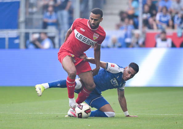 September 12, 2026, SNP Arena, Sinsheim, GER, 1. Bundesliga, TSG Hoffenheim vs. VfB Stuttgart, Josha Vagnoman (Stuttgart), Adam Daghim (Hoffenheim). DFL regulations prohibit any use of photographs as image sequences and or quasi-video. Photo by Hasan Bratic, DeFodi Images