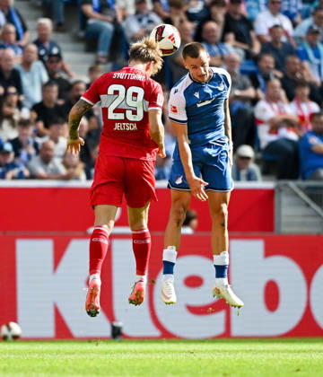 September 12, 2026, SNP Arena, Sinsheim, GER, 1. Bundesliga, TSG Hoffenheim vs. VfB Stuttgart, Finn Jeltsch (Stuttgart), Tim Lemperle (Hoffenheim). DFL regulations prohibit any use of photographs as image sequences and or quasi-video. Photo by Hasan Bratic, DeFodi Images