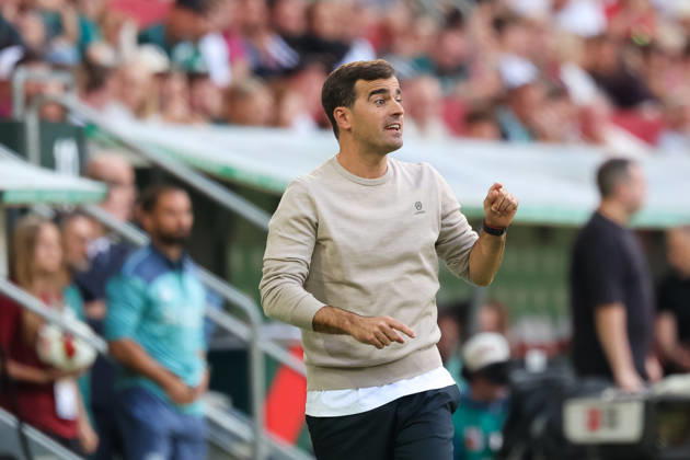 Carles Martinez, Bayer 04 Leverkusen, head coach gesturing; gestures; gesture; body language; cutout; GER; FC Augsburg vs. Bayer 04 Leverkusen; soccer; Bundesliga; Matchday 3; 2026–2027 season, September 12, 2026, DFL and DFB regulations prohibit any use of photographs as image sequences and or quasi-video, GER, FC Augsburg vs. Bayer 04 Leverkusen, soccer, Bundesliga, Matchday 3, 2026–2027 season, September 12, 2026, Augsburg Copyright: xEibner-Pressefoto JennixMaulx EP_JML