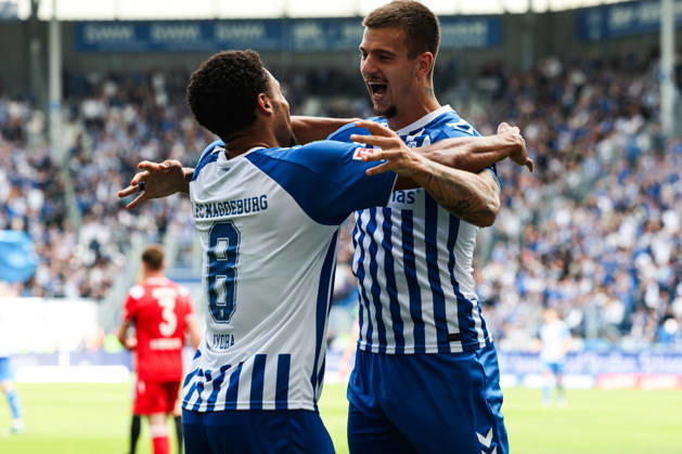 Goal celebration: Goal scorer Emmanuel Iyoha (1 FC Magdeburg, No. 8) scores to make it 3–0, assisted by Mateusz Zukowski (1 FC Magdeburg,22 2 German Bundesliga 2026–2027 season: 1 FC Magdeburg vs. 1 FC Kaiserslautern at the Avnet Arena in Magdeburg; action, soccer, man, men, Germany, September 12, 2026