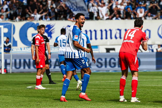 Goal celebration: Goal scorer Emmanuel Iyoha of 1. FC Magdeburg (8) scores to make it 3–0. 2026–2027 Bundesliga season: 1. FC Magdeburg vs. 1. FC Kaiserslautern at the Avnet Arena in Magdeburg. Action, soccer, man,Men, Germany, September 12, 2026
