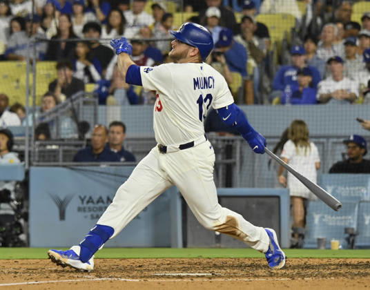 Los Angeles Dodgers Max Muncie hits a solo home run against the San Francisco Giants in a five-run eighth inning at Dodger Stadium in Los Angeles on Friday, September 18, 2026. The Dodgers defeated the Giants 8-2. LAP2026091801 JIMxRUYMEN