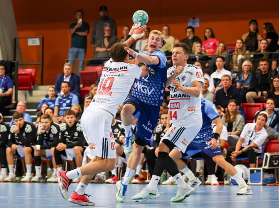 September 24, 2026, Germany, Stuttgart, DHB Cup 2026–2027 Season, TVB Stuttgart vs. HC Erlangen; from left: Florian Scheerer (HCE), Torben Matzken (TVB), Christoph Steinert (HCE)