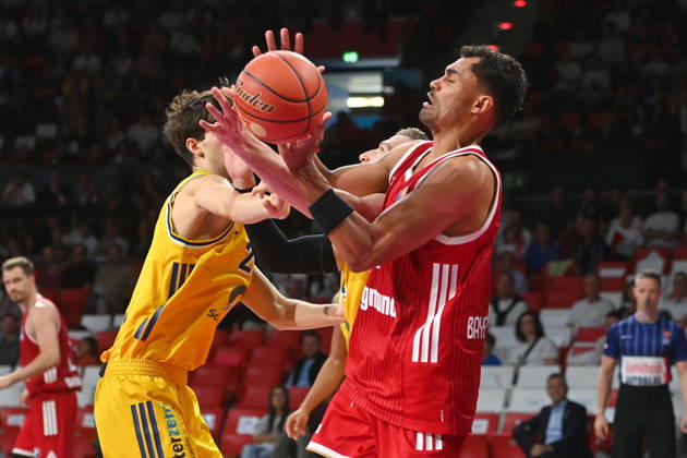 Johannes THIEMANN (FCB), in action, battling for the ball against Nevio BENNEFELD (Alba Berlin) in a BBL basketball game, 2026–2027 season: FC Bayern Munich vs. Alba Berlin on September 26, 2026, at BMW Park