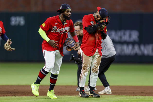 Atlanta Braves center fielder Michael Harris II (23) and Atlanta Braves right fielder Ronald Acuna Jr. (13) celebrate after defeating the Philadelphia Phillies in game three of the MLB, Baseball Herren, USA National League Wild Card round at Truist Park in Atlanta, Georgia on Thursday, October 1, 2026.  ATL20261001341 MIKExZARRILLI