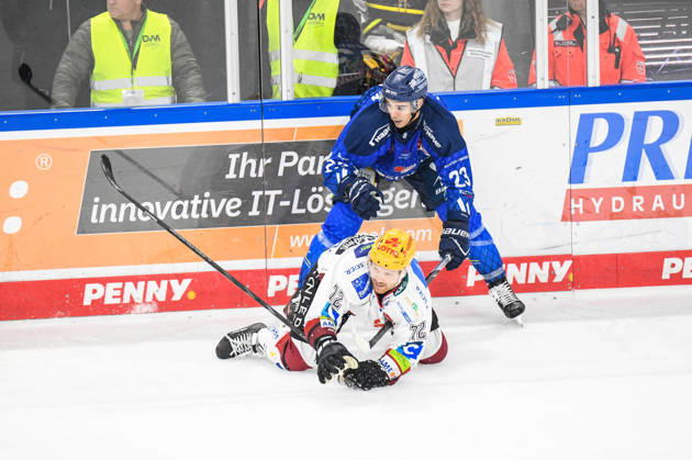 Straubing Tigers vs. Pinguins Bremerhaven, Ice Hockey, German Ice Hockey League, Penny DEL, Matchday 5, 2026–2027 Season, October 2, 2026: J. C. Beaudin of the Straubing Tigers pins Phillip Bruggisser of the Pinguins Bremerhaven to the ice, Men’s Ice Hockey, German Ice Hockey League, Penny DEL, Matchday 5, 2026–2027 Season on October 2, 2026, at the Eisstadion am Pulverturm, Straubing Tigers (blue) vs. Pinguins Bremerhaven (white)