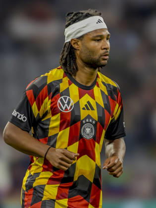Munich, Germany, October 1, 2026 UEFA Nations League 2026–2027 League Phase Group A2 Match 3 Germany vs. Serbia Pictured: Serge Gnabry (GER) warming up DFB and DFL regulations prohibit any use of photographs as image sequences and or quasi-video Allianz Arena Bayern Copyright: xFotostandx xSchäferx