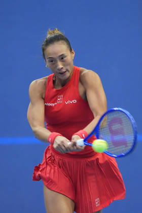 (261003) -- BEIJING, Oct. 3, 2026 -- Zheng Qinwen of China hits a return to Anna Kalinskaya of Russia during the women s singles second round match at 2026 China Open tennis tournament in Beijing, China, Oct. 3, 2026. ) (SP)CHINA-BEIJING-TENNIS-CHINA OPEN-WOMEN S SINGLES(CN) XiexHan