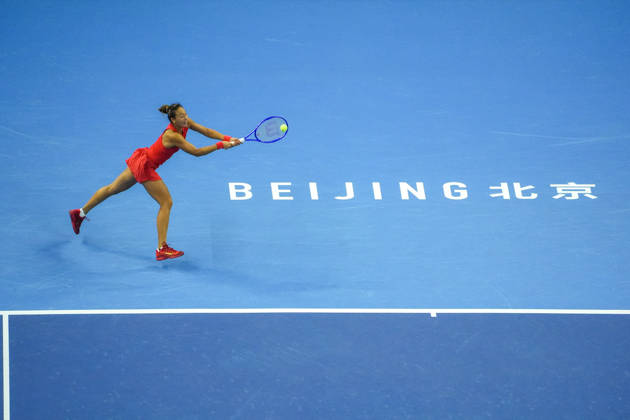 (261003) -- BEIJING, Oct. 3, 2026 -- Zheng Qinwen of China hits a return to Anna Kalinskaya of Russia during the women s singles second round match at 2026 China Open tennis tournament in Beijing, China, Oct. 3, 2026. ) (SP)CHINA-BEIJING-TENNIS-CHINA OPEN-WOMEN S SINGLES(CN) XiexHan