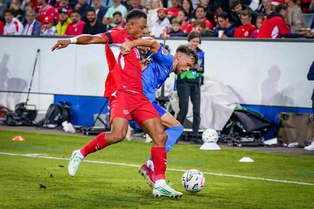 Soccer: UEFA Nations League 2026–2027, Matchday 3: Switzerland vs. Slovenia at Thermoplan Arena Lucerne—Dan Ndoye (Switzerland, No. 11) and David Brekalo (Slovenia, No. 23) in a tackle Copyright: xJOERANxSTEINSIEKx