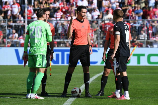 Soccer friendly match: FC Viktoria Köln vs. 1. FC Köln on October 3, 2026, at Sportpark Höhenberg in Cologne. Coin toss: Ron Robert Zieler (Cologne), left; referee Nils Leichert, center; David Otto (Cologne), right xRx
