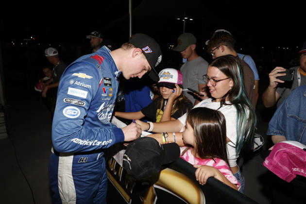 LAS VEGAS, CA - OCTOBER 03: Corey Day ( 17 Hendrick Motorsports HendrickCars.com Chevrolet) signs autographs in victory lane after winning the Focused Health 302 NASCAR, Motorsport, USA O™Reilly Auto Parts Series race on October 3, 2026, at Las Vegas Motor Speedway in Las Vegas, NV. (Photo by Jeff Speer LVMS Icon Sportswire) AUTO: OCT 03 NASCAR O™Reilly Auto Parts Series Focused Health 302 EDITORIAL USE ONLY Icon26100318944