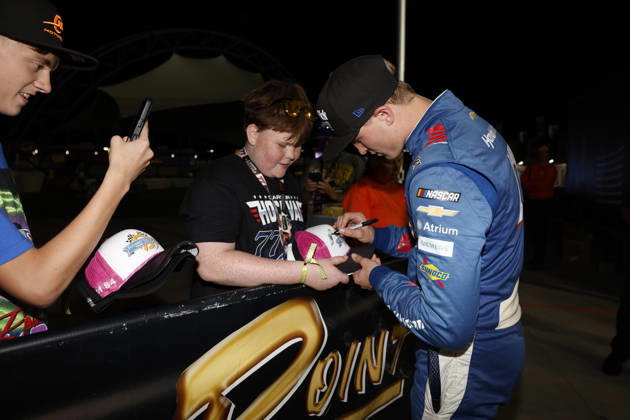 LAS VEGAS, CA - OCTOBER 03: Corey Day ( 17 Hendrick Motorsports HendrickCars.com Chevrolet) signs autographs in victory lane after winning the Focused Health 302 NASCAR, Motorsport, USA O™Reilly Auto Parts Series race on October 3, 2026, at Las Vegas Motor Speedway in Las Vegas, NV. (Photo by Jeff Speer LVMS Icon Sportswire) AUTO: OCT 03 NASCAR O™Reilly Auto Parts Series Focused Health 302 EDITORIAL USE ONLY Icon26100319016