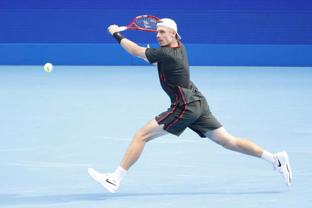October 4, 2026, Tokyo, Japan: Denis Shapovalov (Canada) returns a shot against Carlos Alcaraz (Spain) during their quarterfinal match at the Kinoshita Group Japan Open Tennis Championships at Ariake Colosseum in Tokyo. Shapovalov suffered an injury, forcing him to retire early in the second set. The tournament runs from September 29 to October 6. Alcaraz won 7-6(3), 2-1 Tokyo Japan - ZUMAm191 20261004_aap_m191_069 Copyright: xRodrigoxReyesxMarinx
