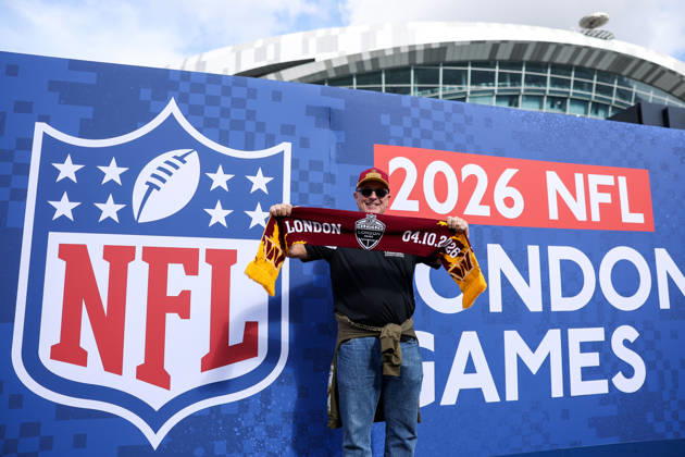 4th October 2026; Tottenham Hotspur Stadium, London, England; NFL, American Football Herren, USA International Series American Football, Washington Commanders versus Indianapolis Colts; a fan poses for a photo outside of the stadium HenningxVonxJagow
