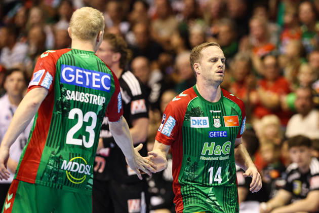 Omar Ingi Magnusson (SC Magdeburg, 14) and Magnus Saugstrup (SC Magdeburg, 23) – Handball Bundesliga 2026–2027 season: SC Magdeburg vs. HC Erlangen at the GETEC Arena in Magdeburg. Action, handball,Germany, October 4, 2026