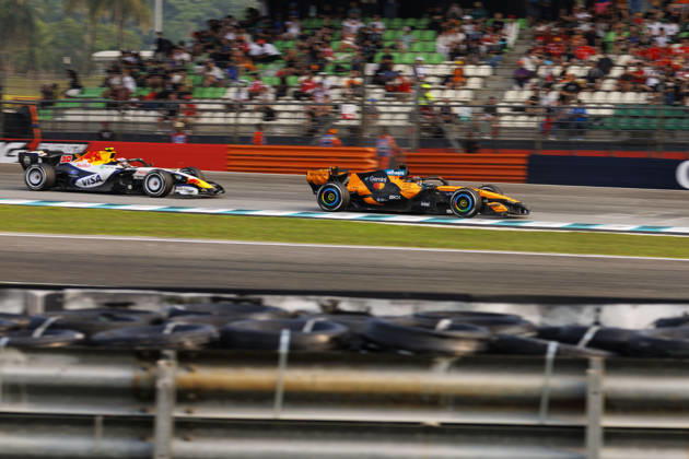 4th October 2026; Sepang IC, Kuala Lumpur, Malaysia; Formula 1, Bahrain Grand Prix, Race Day; Scuderia Ferrari HP driver Charles Leclerc of Monaco, Visa Cash App Racing Bulls Formula One Team driver Liam Lawson of New Zealand during the race StephenxBlackberry