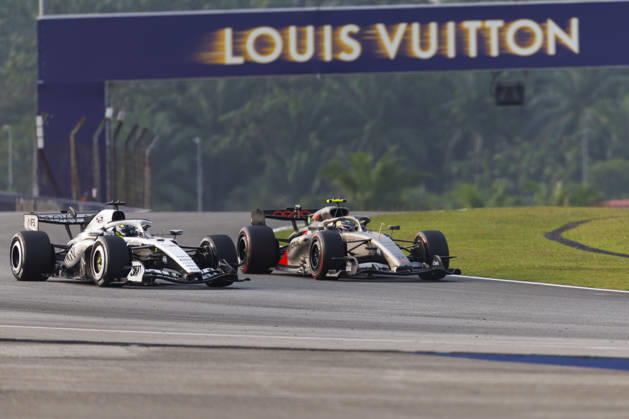 4th October 2026; Sepang IC, Kuala Lumpur, Malaysia; Formula 1, Bahrain Grand Prix, Race Day; Cadillac Formula 1 Team driver Sergio Perez of Mexico, Audi Revolut F1 Team driver Gabriel Bortoleto of Brazil during the race StephenxBlackberry