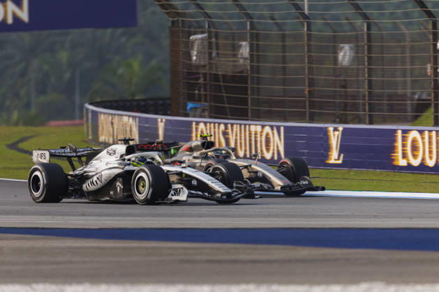 4th October 2026; Sepang IC, Kuala Lumpur, Malaysia; Formula 1, Bahrain Grand Prix, Race Day; Cadillac Formula 1 Team driver Sergio Perez of Mexico, Audi Revolut F1 Team driver Gabriel Bortoleto of Brazil during the race StephenxBlackberry