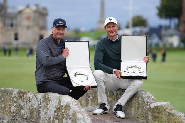 RECORD DATE NOT STATED 4th October 2026; Old Course at St Andrews, St Andrews, Scotland; DP World Tour Golf, Alfred Dunhill Links Championship, Final Day; Tom Chaplin and Adrian Meronk hold the team championship trophy on the Swilcan Bridge AlecxBrown