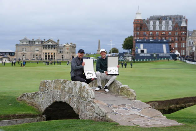 RECORD DATE NOT STATED 4th October 2026; Old Course at St Andrews, St Andrews, Scotland; DP World Tour Golf, Alfred Dunhill Links Championship, Final Day; Tom Chaplin and Adrian Meronk hold the team championship trophy on the Swilcan Bridge AlecxBrown