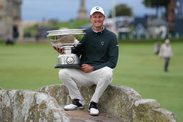 RECORD DATE NOT STATED 4th October 2026; Old Course at St Andrews, St Andrews, Scotland; DP World Tour Golf, Alfred Dunhill Links Championship, Final Day; Adrian Meronk holds the Alfred Dunhill trophy on the Swilcan Bridge after winning the tournament and becoming champion golfer AlecxBrown