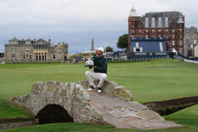 RECORD DATE NOT STATED 4th October 2026; Old Course at St Andrews, St Andrews, Scotland; DP World Tour Golf, Alfred Dunhill Links Championship, Final Day; Adrian Meronk kisses the Alfred Dunhill trophy on the Swilcan Bridge after winning the tournament and becoming champion golfer AlecxBrown
