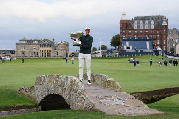 RECORD DATE NOT STATED 4th October 2026; Old Course at St Andrews, St Andrews, Scotland; DP World Tour Golf, Alfred Dunhill Links Championship, Final Day; Adrian Meronk lifts the Alfred Dunhill trophy on the Swilcan Bridge after winning the tournament and becoming champion golfer AlecxBrown
