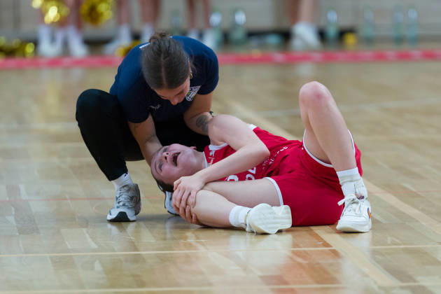 Nicole Brochlitz (Lions), No. 6, is lying on the floor injured during the Lions vs. TK Hannover Luchse game, women s basketball, 1st Bundesliga, DBBL, Matchday 1 of the 2026–27 season, April 10, 2026, at the SWH Arena in Halle, Saxony-Anhalt, Germany