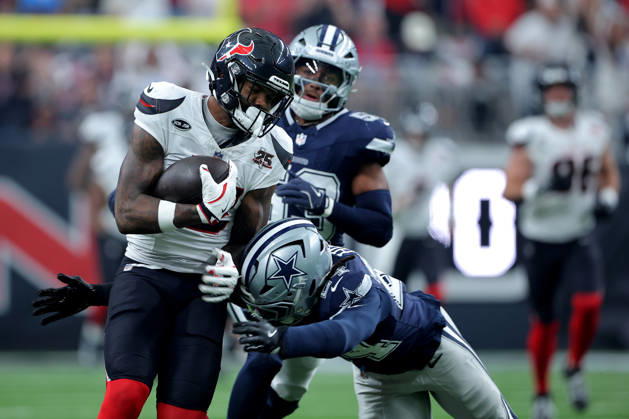 October 4, 2026, Houston, Texas, U.S: Houston Texans wide receiver Nico Collins (12) is tackled by Dallas Cowboys safety Malik Hooker (24) after a catch during the first quarter of the NFL, American Football Herren, USA regular season game between the Houston Texans and the Dallas Cowboys at Reliant Stadium in Houston, TX on October 4, 2026. NFL 2026 - Dallas Cowboys Vs Houston Texans  - ZUMAw137 20261004_aap_w137_035 Copyright: xErikxWilliamsx
