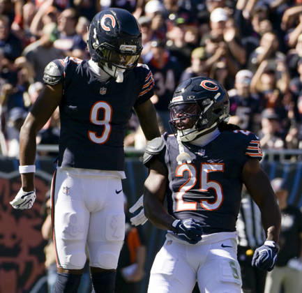 Chicago Bears running back Kyle Monangai (25) celebrates his first quarter touchdown against the New York Jets with Jahdae Walker (9) at Soldier Field in Chicago on Sunday, October 4, 2026. CHI20261004104 MARKxBLACK