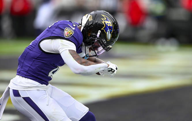 Baltimore Ravens wide receiver Zay Flowers (4) reacts after a 19 yard pass reception and touchdown against the Tennessee Titans during the second quarter at M&T Bank Stadium in Baltimore, Maryland, on Sunday, October 4, 2026.  BAL20261004 DAVIDxTULIS