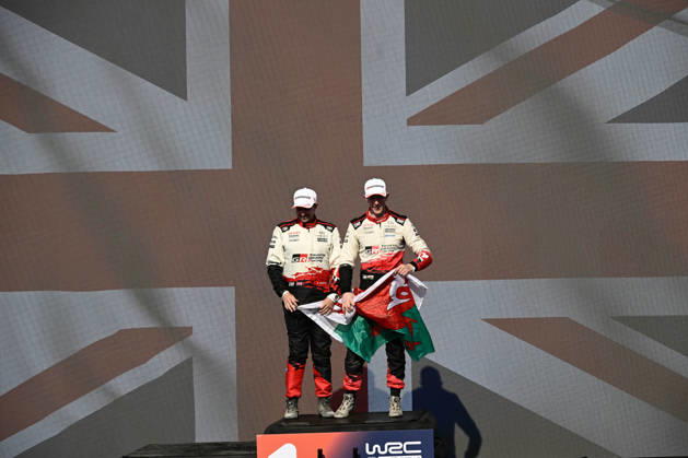 IPA89309432 - ,Driver Elfyn Evans and Co-Driver Scott Martin of the Toyota Gazoo Racing WRT team, driving the Toyota GR Yaris Rally1, celebrate their victory as champions during the FIA World Rally Championship WRC, Motorsport Rallye, WM Rally Italia Sardegna 2026 on October 4 in Alghero, Sardinia, Italy Copyright: xLucaxBarsali IPAxSportx xx IPA89309432