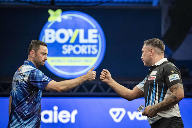 RECORD DATE NOT STATED 4th October 2026; Mattioli Arena, Leicester, England; PDC World Grand Prix Darts, World Grand Prix, Final Day; Gerwyn Price fist bumps his opponent Luke Humphries before their final match GodfreyxPitt