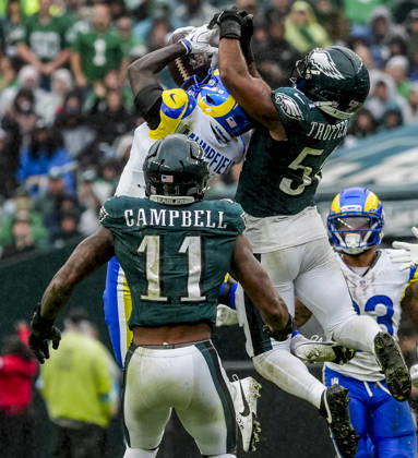October 4, 2026, Philadelphia, Pa, USA: Oct 4, 2026; Philadelphia, PA, USA; Philadelphia Eagles linebacker Jeremiah Trotter Jr. (54) and Los Angeles Rams wide receiver Konata Mumpfield (4) vying for a jump ball during the Rams 24-20 wins against the Eagles at Lincoln Financial Field. Mandatory Credit: -Cal Media Philadelphia USA - ZUMAcs17 20261004_faf_cs17_179 Copyright: xScottxSeriox