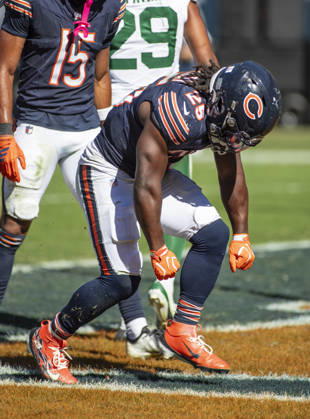 October 4, 2026: Chicago Bears Kyle Monangai (25) celebrates a touchdown during the NFL, American Football Herren, USA game against the New York Jets in Chicago, IL. CSM NFL 2026: Jets Vs Bears OCT 04 - ZUMAc04_ 20261004_zma_c04_207 Copyright: xMikexWulfx